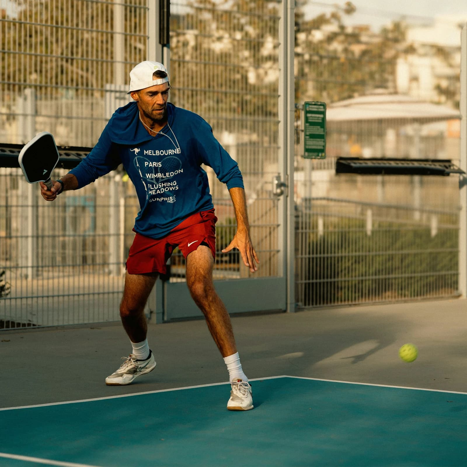 A pickleball player stepping into a rally